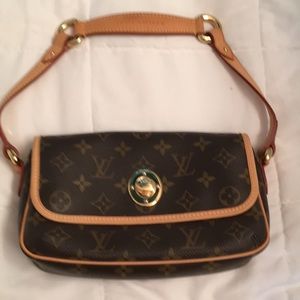 Louis Vuitton clutch style bag